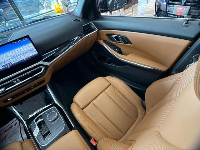 Photo of 2024 Jet Black BMW 330