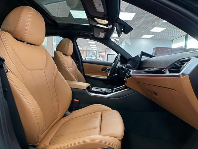 Photo of 2024 Jet Black BMW 330