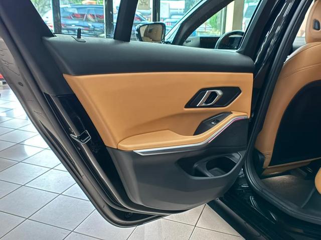 Photo of 2024 Jet Black BMW 330