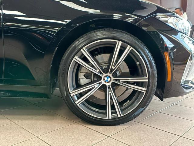 Photo of 2024 Jet Black BMW 330