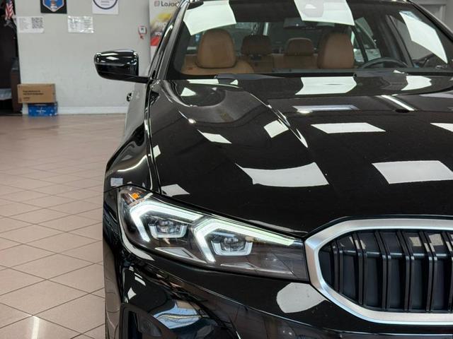 Photo of 2024 Jet Black BMW 330
