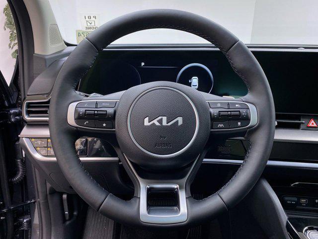 Photo of 2025 Gravity Gray Kia Sportage Hybrid