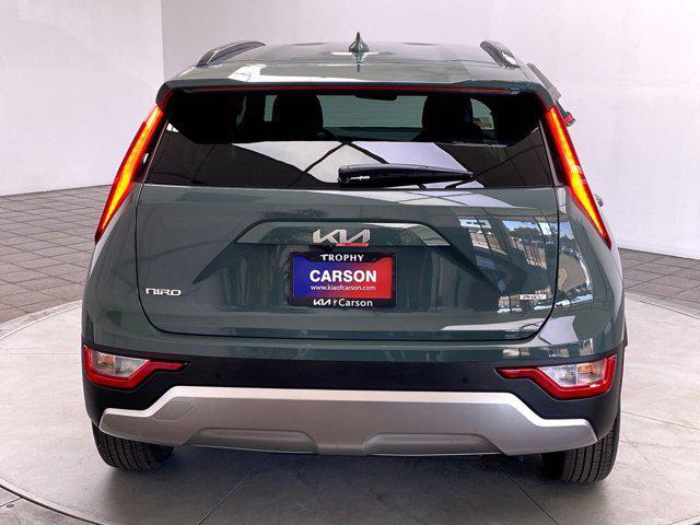 Photo of 2025 Cityscape Green Kia Niro Plug-In Hybrid