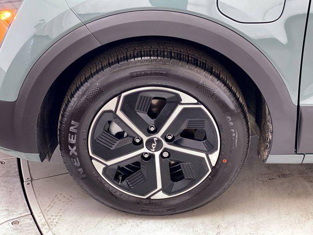 Photo of 2025 Cityscape Green Kia Niro Plug-In Hybrid