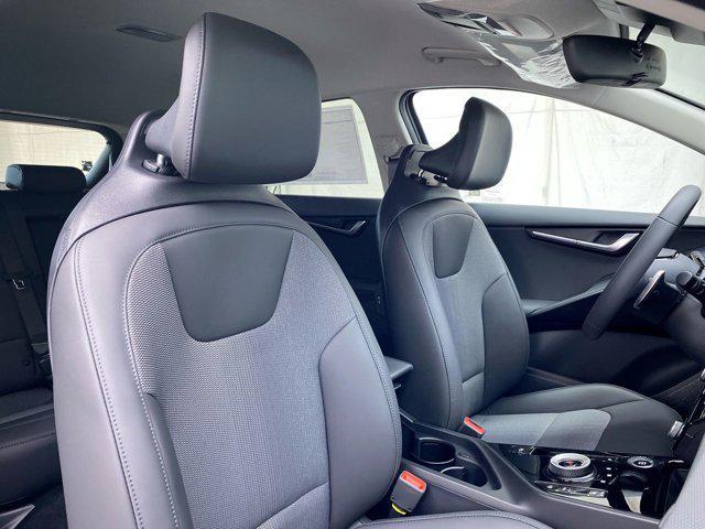 Photo of 2025 Cityscape Green Kia Niro Plug-In Hybrid