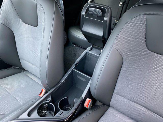 Photo of 2025 Cityscape Green Kia Niro Plug-In Hybrid