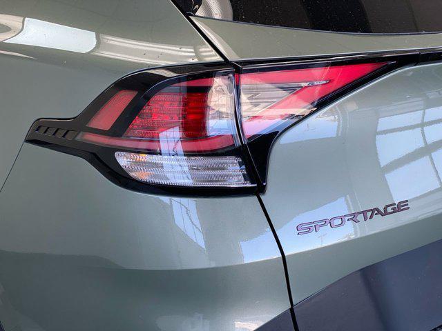 Photo of 2025 Jungle Green Kia Sportage
