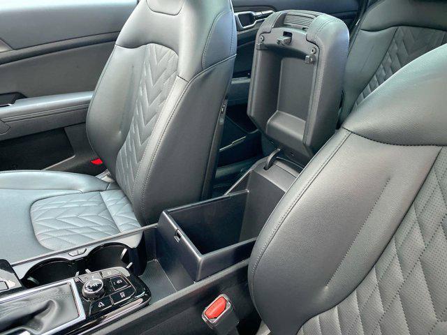 Photo of 2025 Jungle Green Kia Sportage