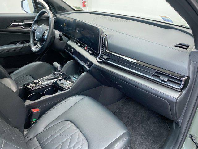 Photo of 2025 Jungle Green Kia Sportage