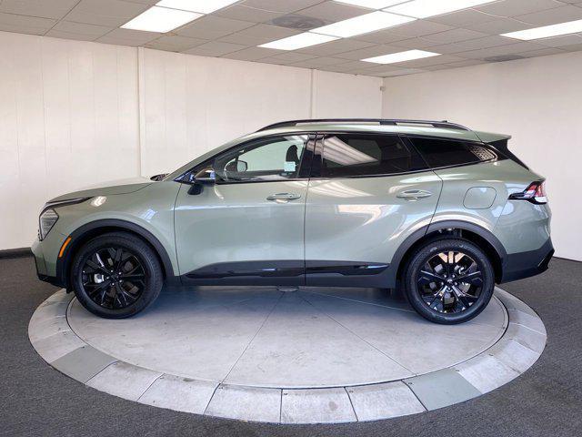 Photo of 2025 Jungle Green Kia Sportage