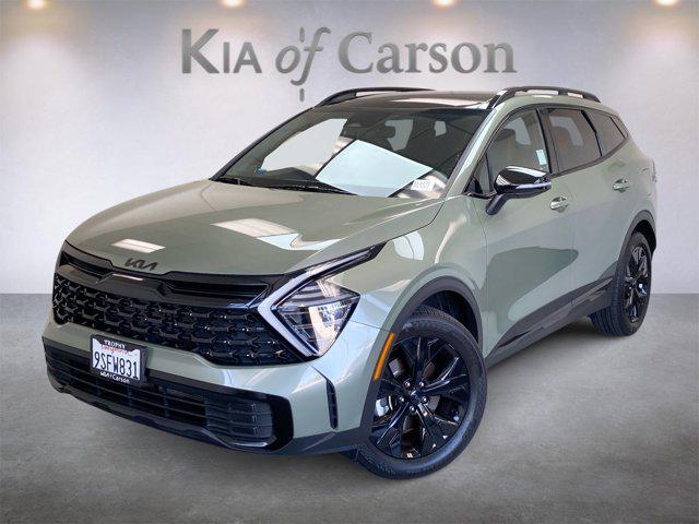 Photo of 2025 Jungle Green Kia Sportage