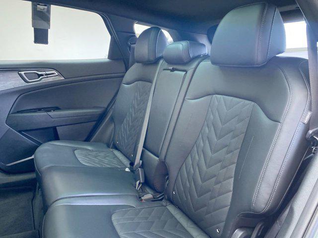 Photo of 2025 Jungle Green Kia Sportage