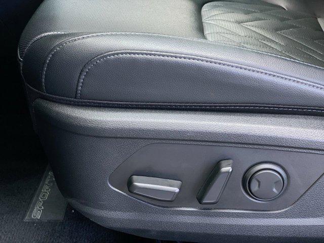 Photo of 2025 Jungle Green Kia Sportage