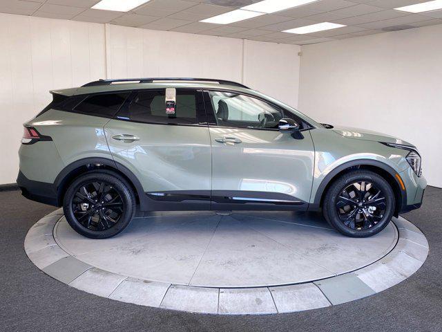 Photo of 2025 Jungle Green Kia Sportage