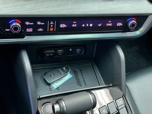 Photo of 2025 Jungle Green Kia Sportage