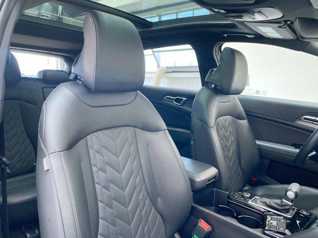 Photo of 2025 Jungle Green Kia Sportage