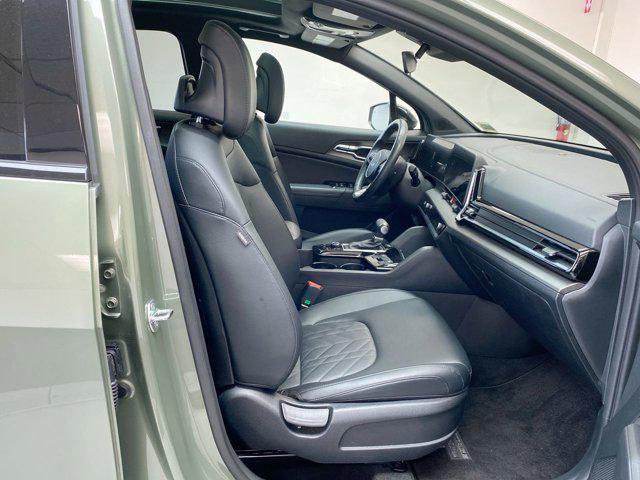 Photo of 2025 Jungle Green Kia Sportage