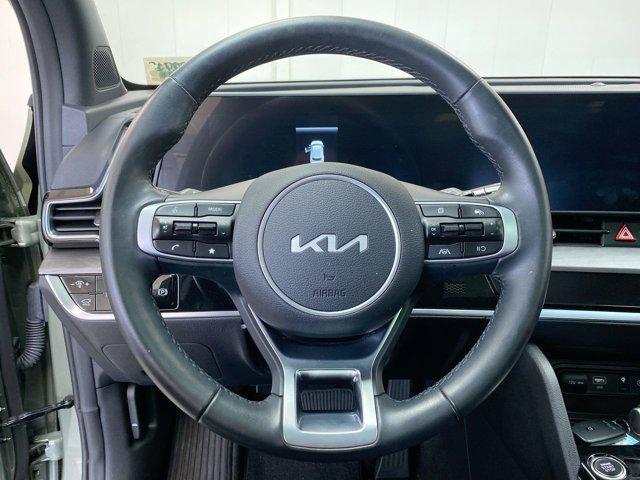 Photo of 2025 Jungle Green Kia Sportage
