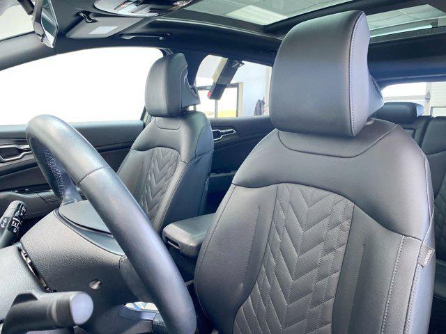 Photo of 2025 Jungle Green Kia Sportage