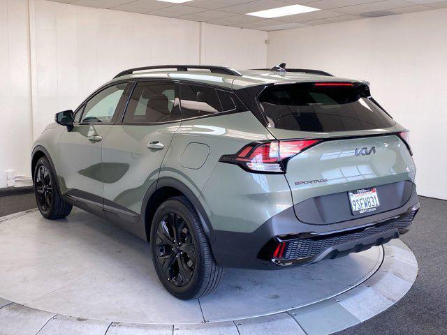 Photo of 2025 Jungle Green Kia Sportage