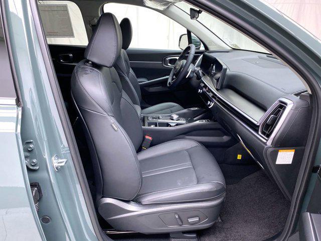 Photo of 2025 Cityscape Green Kia Sorento Hybrid