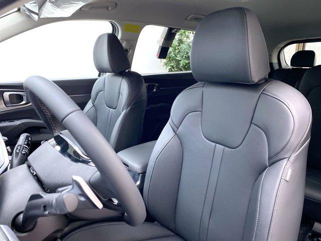 Photo of 2025 Cityscape Green Kia Sorento Hybrid