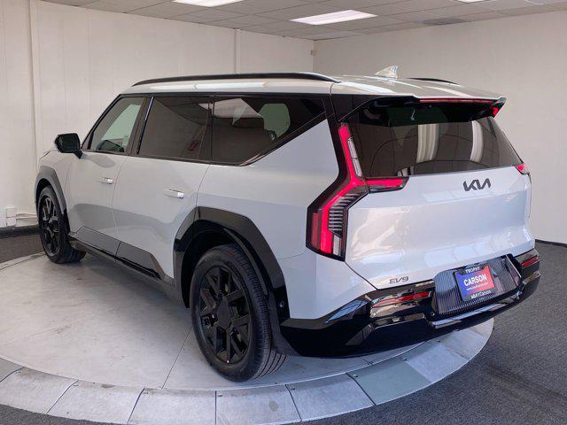 Photo of 2026 Ivory Silver Kia EV9