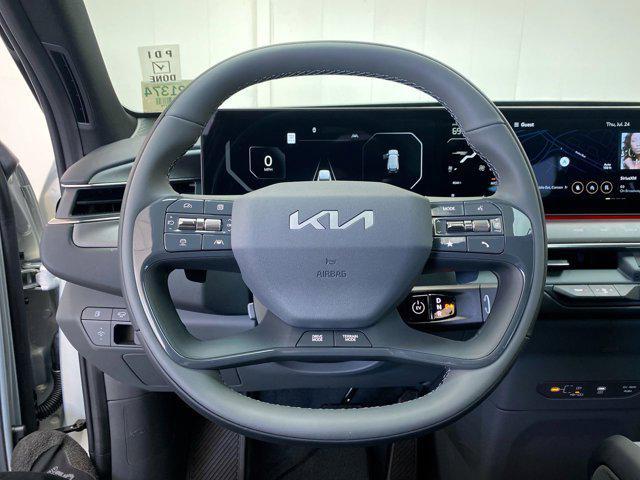Photo of 2026 Ivory Silver Kia EV9