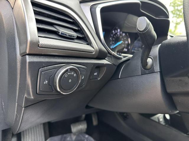 Photo of 2017 Ingot Silver Ford Fusion Hybrid