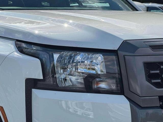 Photo of 2025 Glacier White Nissan Frontier