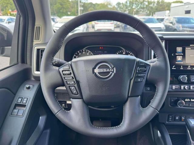 Photo of 2025 Glacier White Nissan Frontier