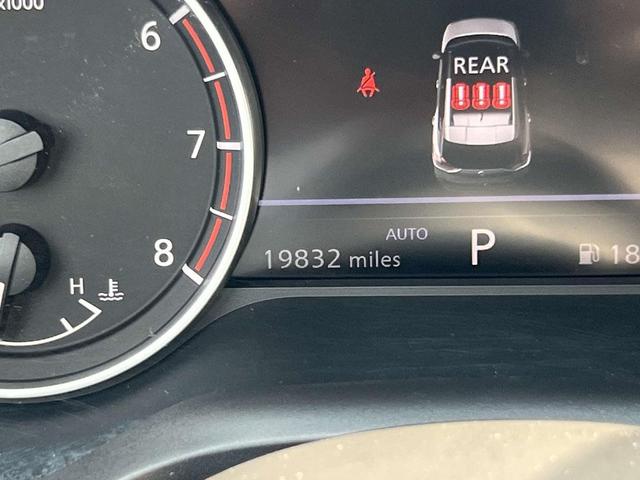 Photo of 2023 Pearl White Tricoat Nissan Rogue