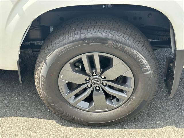 Photo of 2025 Glacier White Nissan Frontier