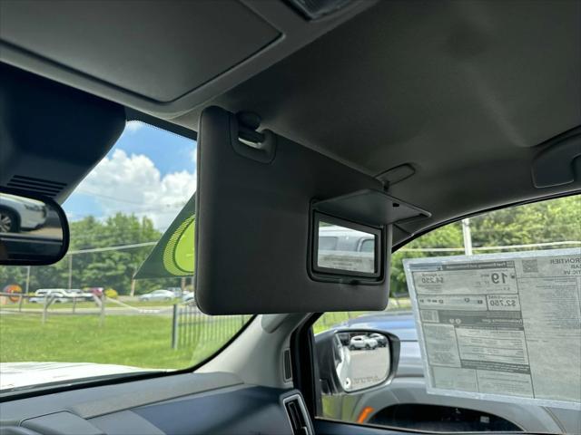 Photo of 2025 Glacier White Nissan Frontier