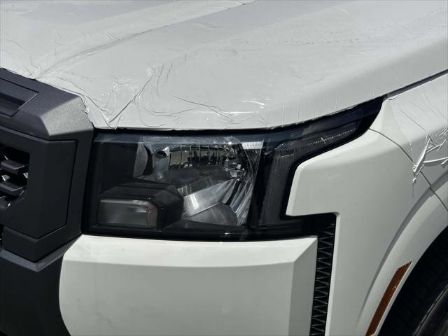 Photo of 2025 Glacier White Nissan Frontier