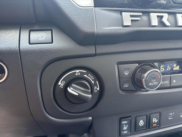 Photo of 2025 Glacier White Nissan Frontier