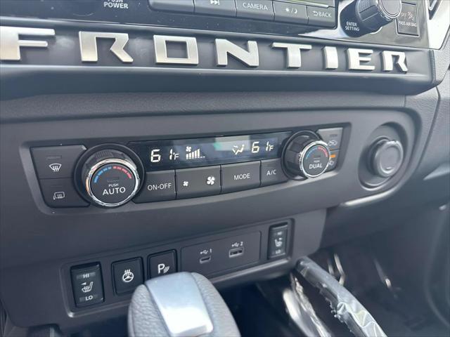 Photo of 2025 Glacier White Nissan Frontier