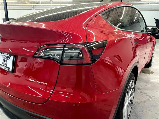 Photo of 2023 Red Multi-Coat Tesla Model Y
