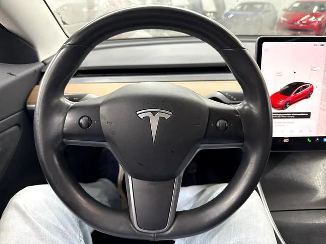 Photo of 2018 Red Multi-Coat Tesla Model 3