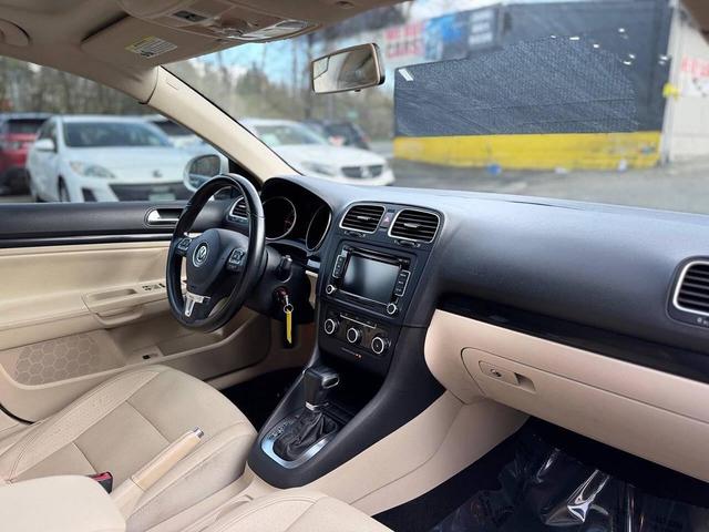 Photo of 2011 Candy White Volkswagen Jetta SportWagen