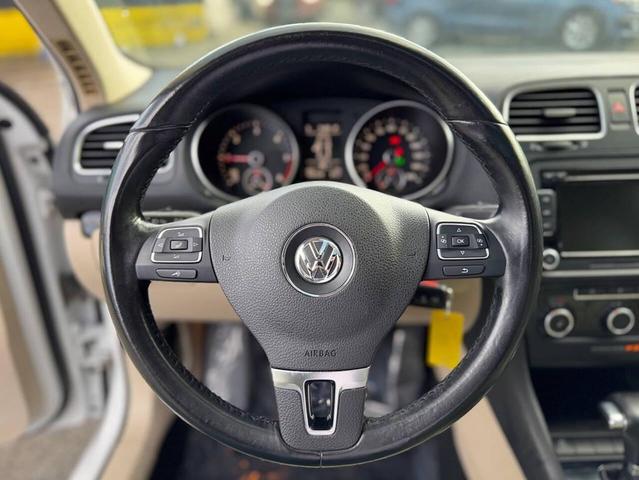 Photo of 2011 Candy White Volkswagen Jetta SportWagen