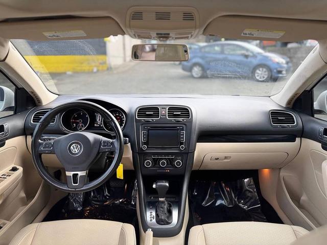 Photo of 2011 Candy White Volkswagen Jetta SportWagen