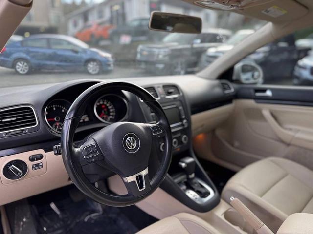 Photo of 2011 Candy White Volkswagen Jetta SportWagen