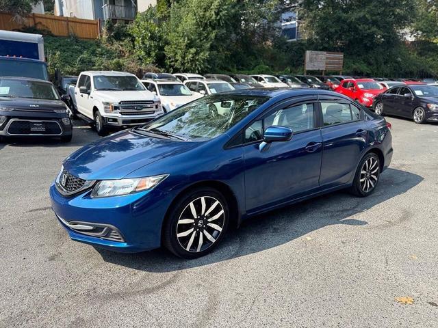 Photo of 2014 Dyno Blue Pearl Honda Civic