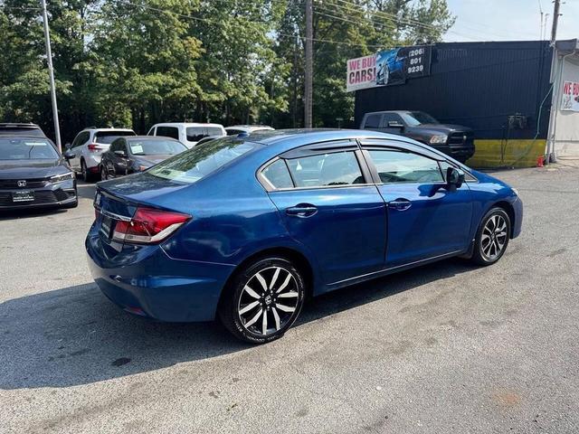 Photo of 2014 Dyno Blue Pearl Honda Civic