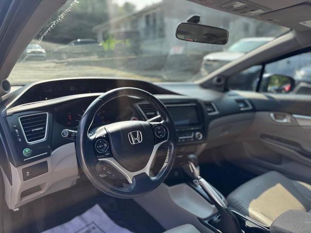 Photo of 2014 Dyno Blue Pearl Honda Civic