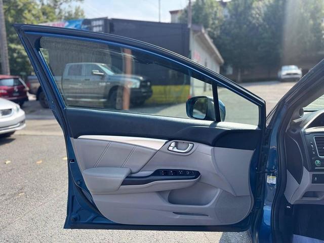 Photo of 2014 Dyno Blue Pearl Honda Civic