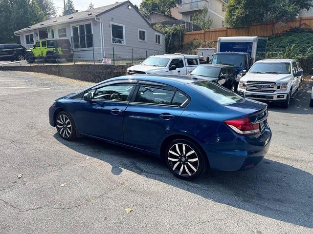 Photo of 2014 Dyno Blue Pearl Honda Civic