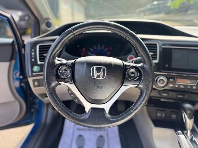 Photo of 2014 Dyno Blue Pearl Honda Civic