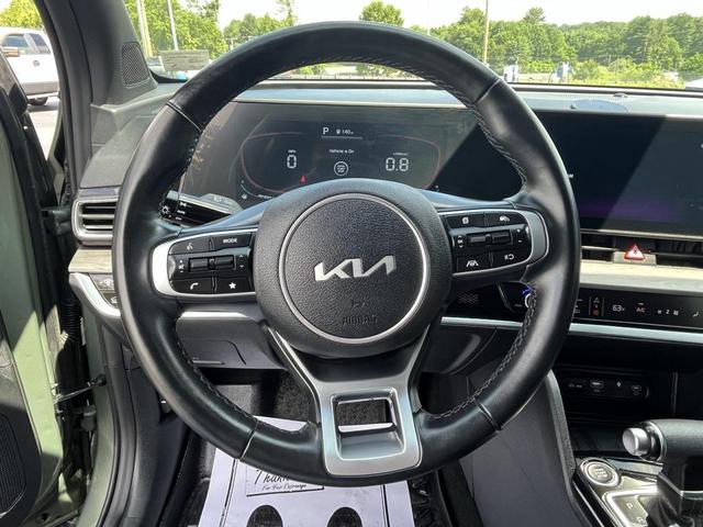 Photo of 2024 Jungle Green Kia Sportage